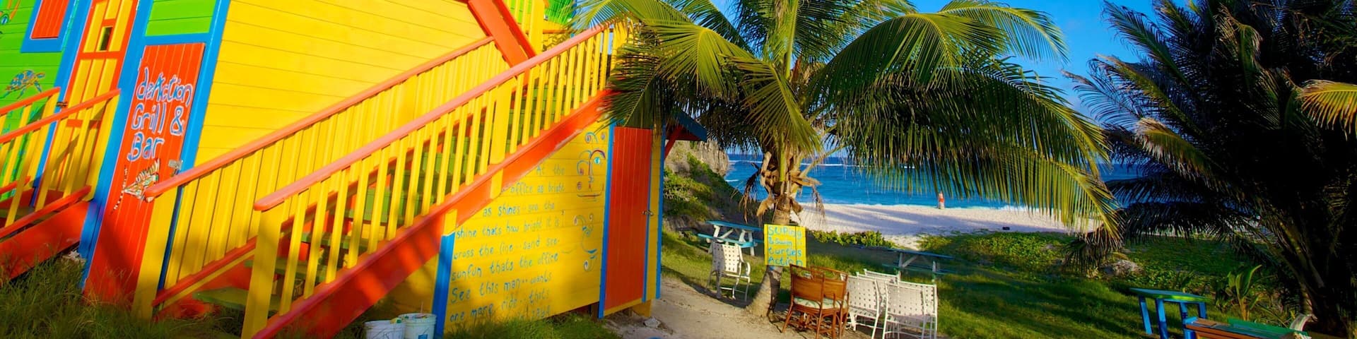Silver Sands Beach showing a beach, a house and tropical scenes