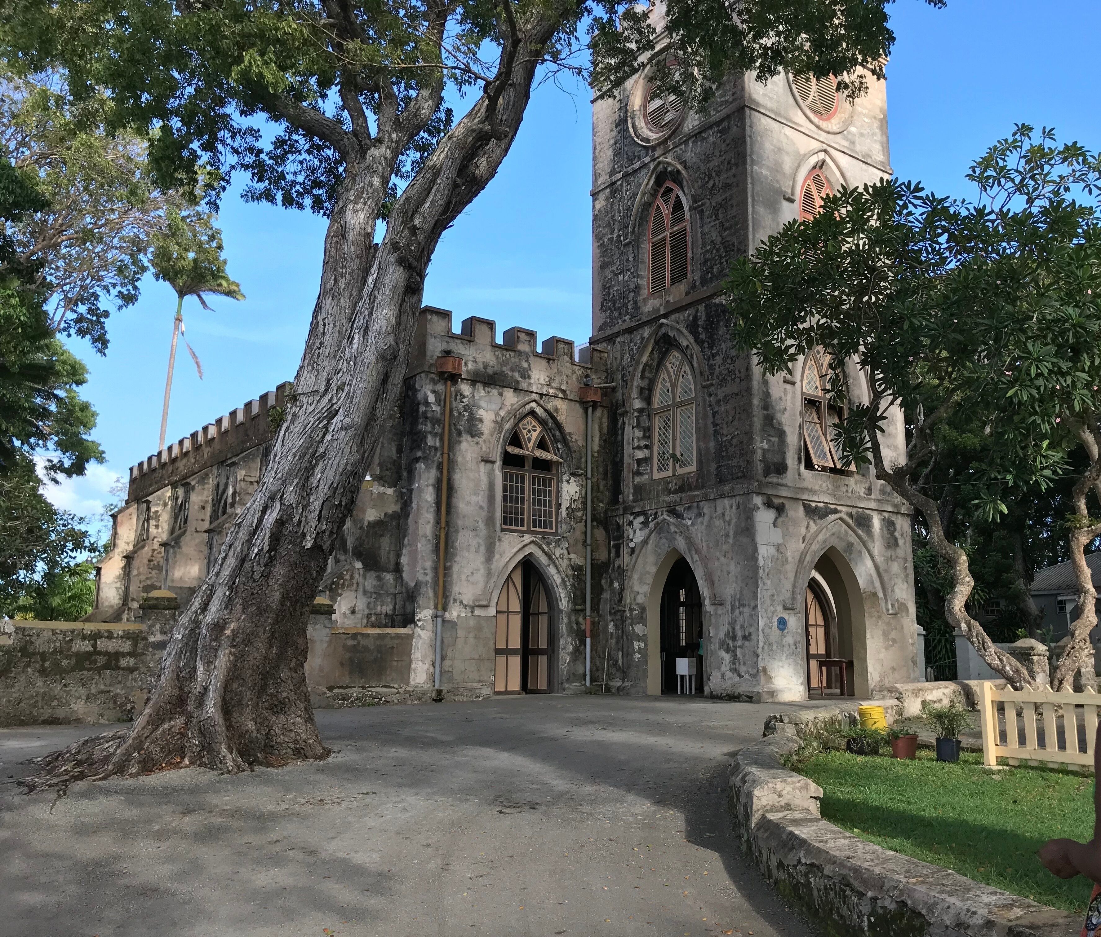A historic church with arched windows and a clock tower.