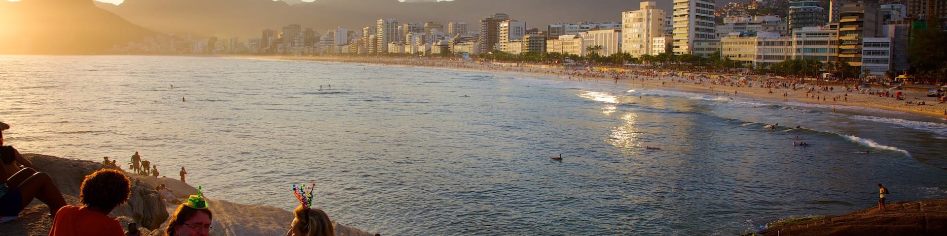 Arpoador Beach which includes a sunset