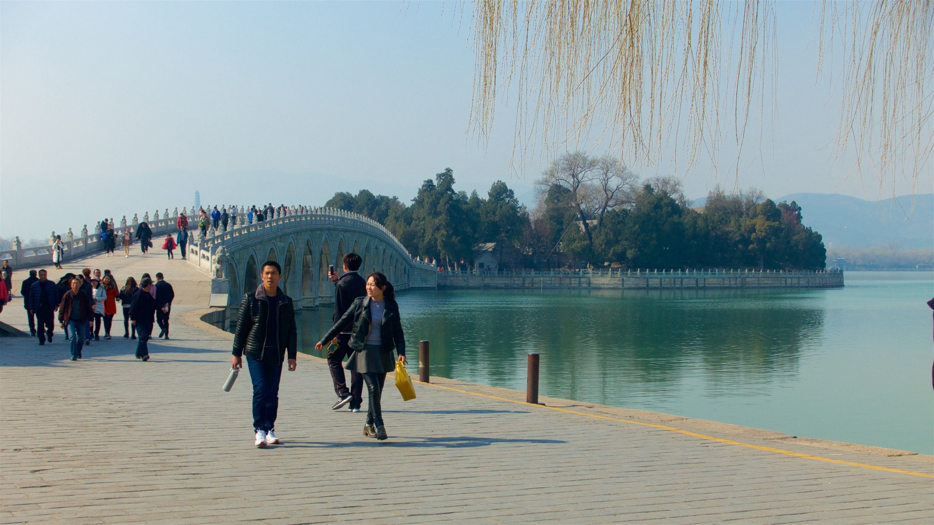 Summer Palace which includes a river or creek and a bridge as well as a couple
