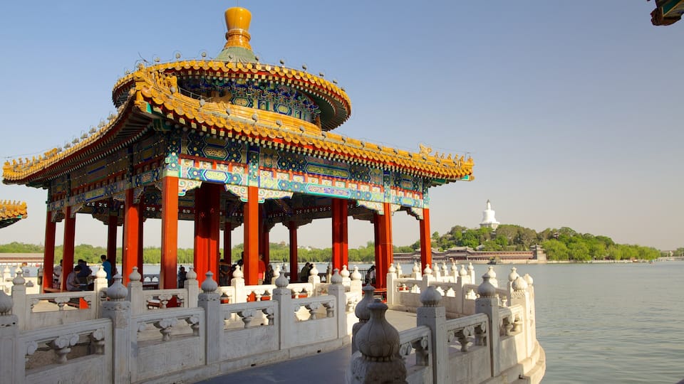 Beihai Park which includes a river or creek, heritage architecture and a temple or place of worship