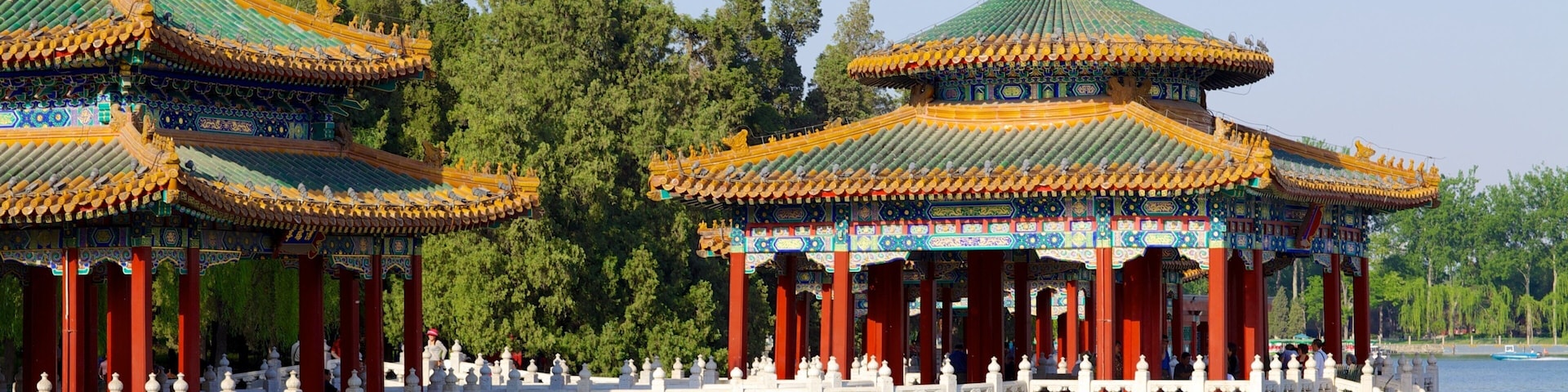 Beihai Park which includes a river or creek, heritage architecture and a temple or place of worship