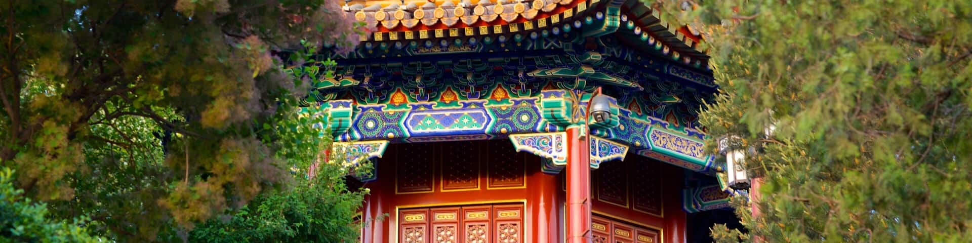 A traditional Chinese temple with ornate architecture, including a multi-tiered roof and colorful decorations.