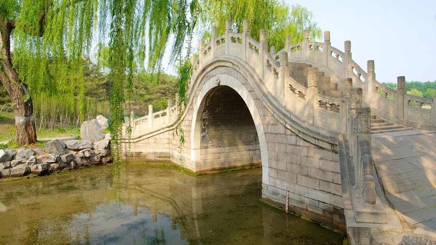 Old Summer Palace featuring a bridge, a river or creek and a park