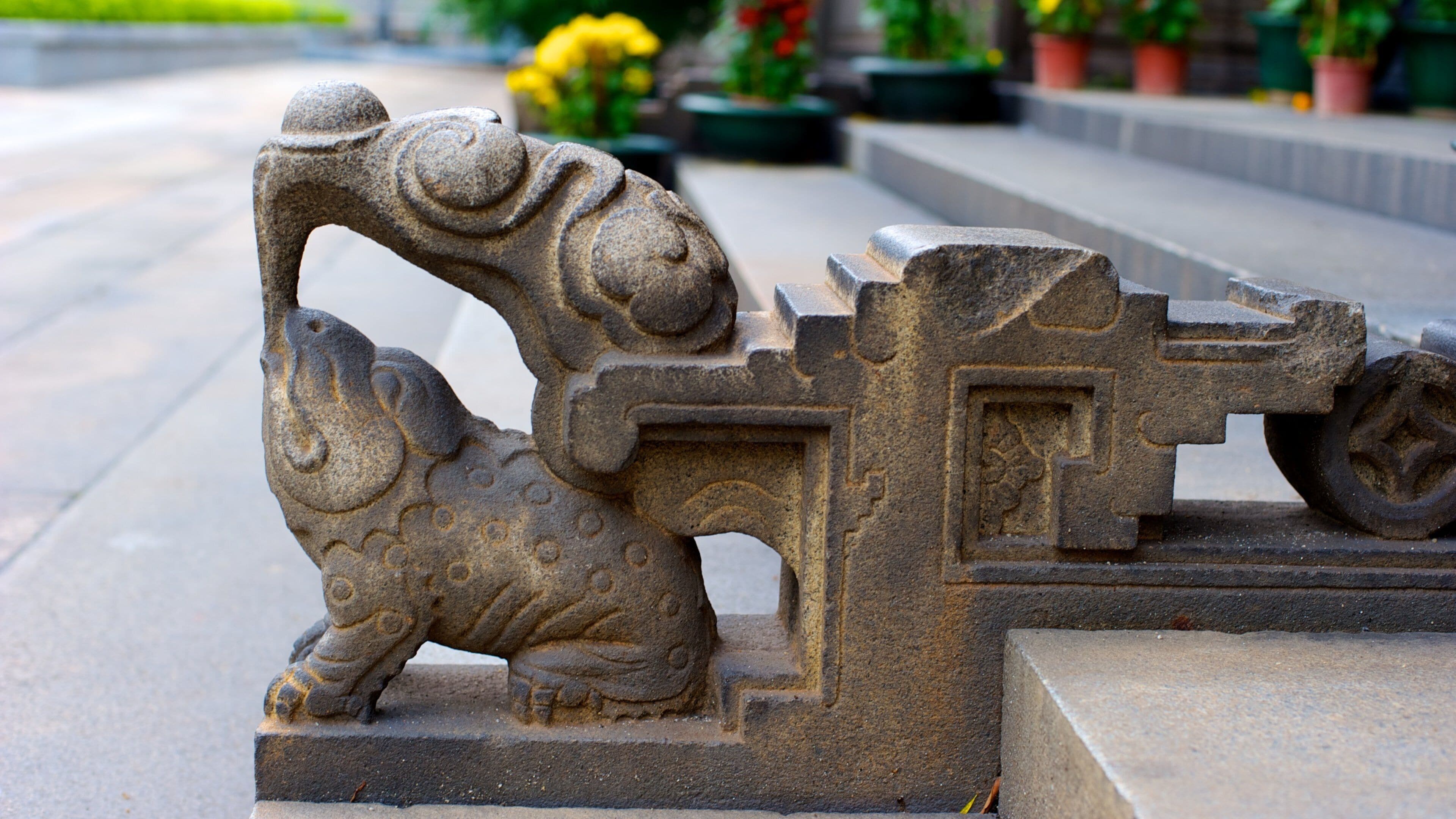 Museo de Arte Popular de Guangdong mostrando una estatua o escultura y arte al aire libre