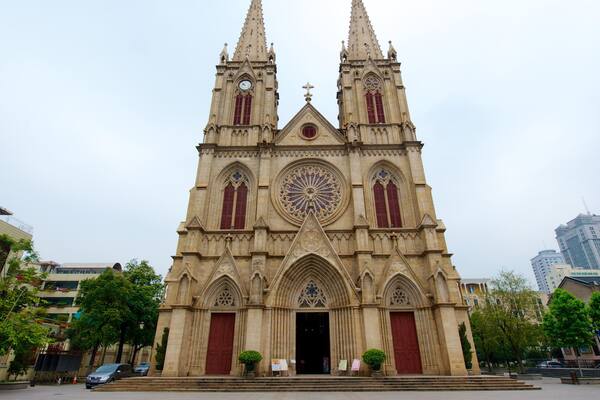 Sacred Heart Cathedral featuring religious aspects, heritage architecture and a city