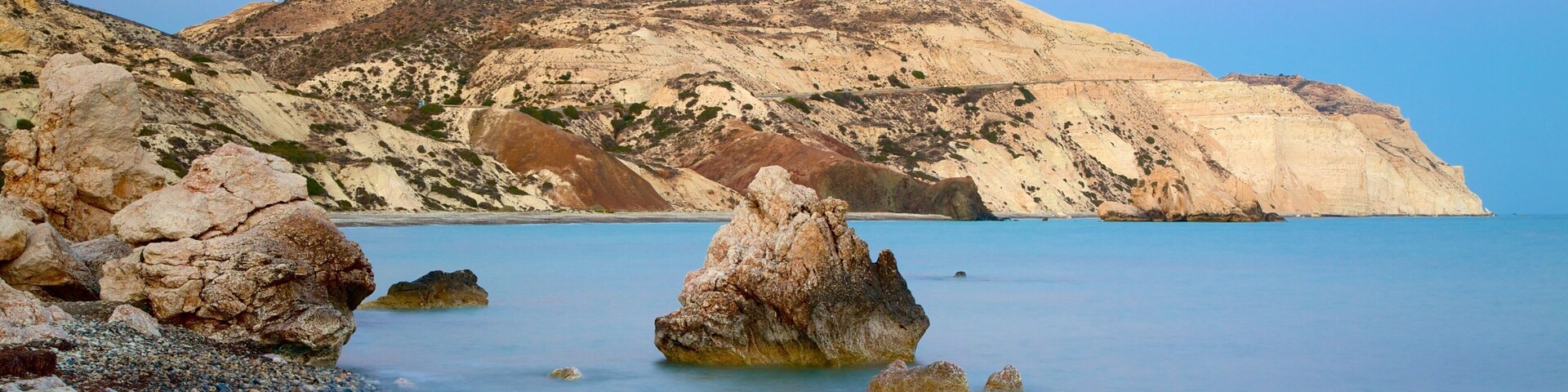 Aphrodite\'s Rock which includes rugged coastline