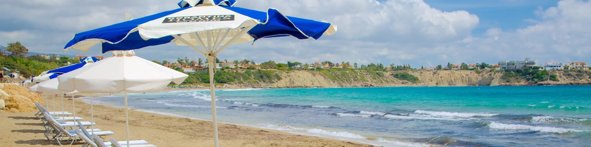 Coral Bay Beach featuring a beach