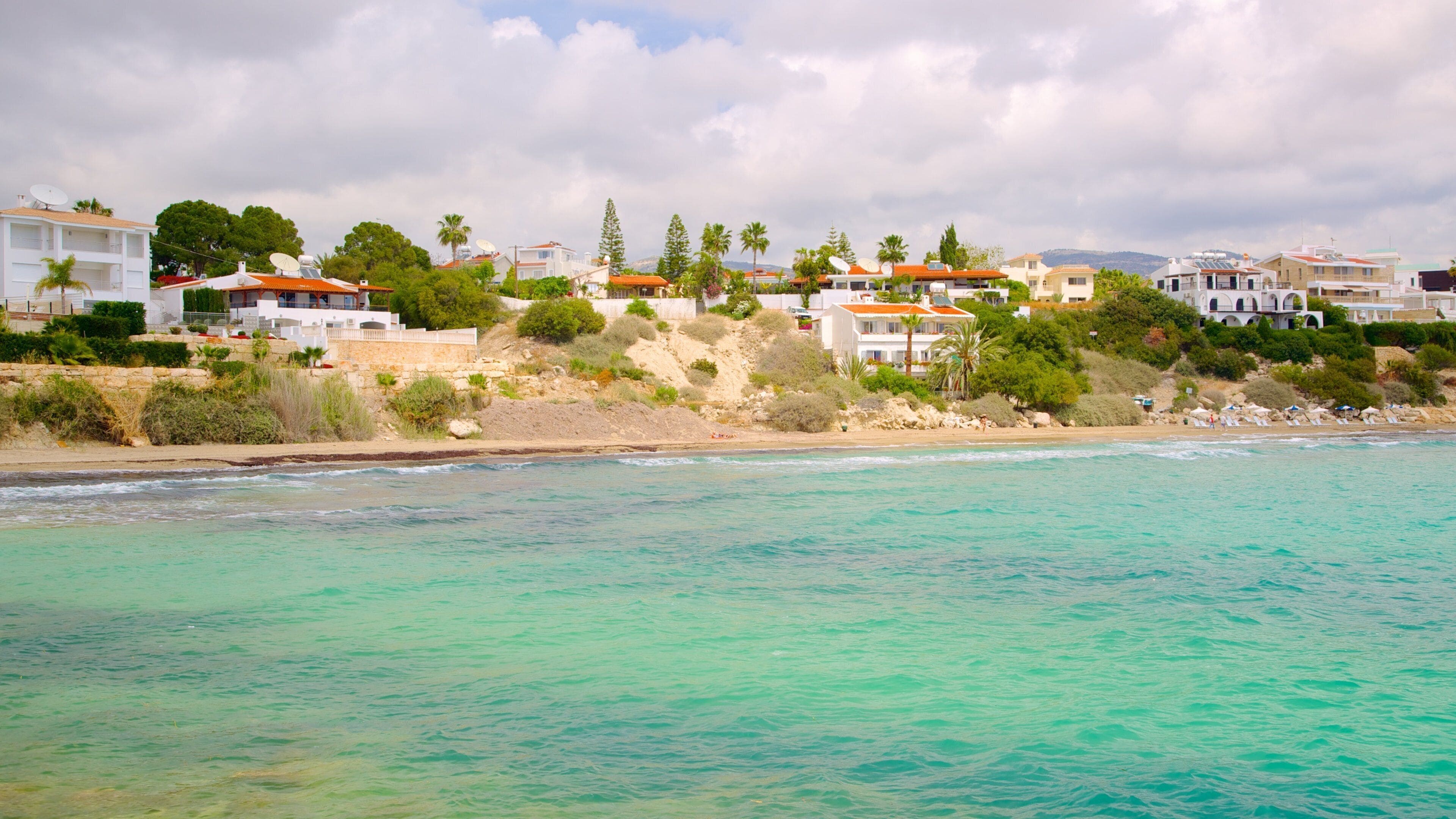 Coral Bay Beach che include baia e porto, località costiera e vista della costa