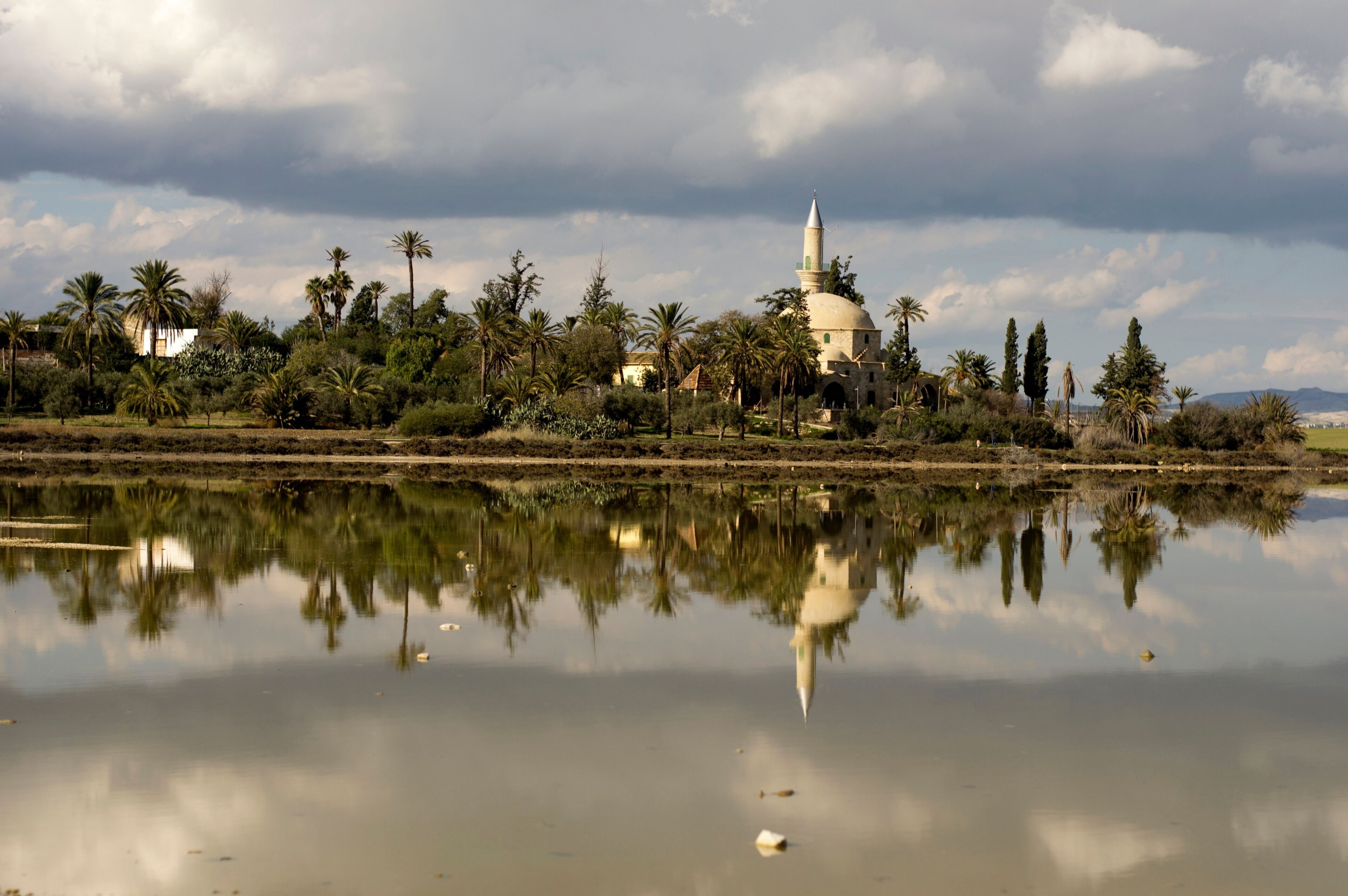 Landscape of Hala Sultan Tekke mosque in Cyprus with cloudy sky