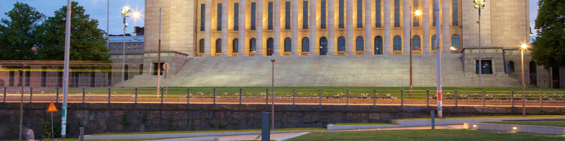 Parliament Building which includes an administrative buidling, night scenes and a sunset