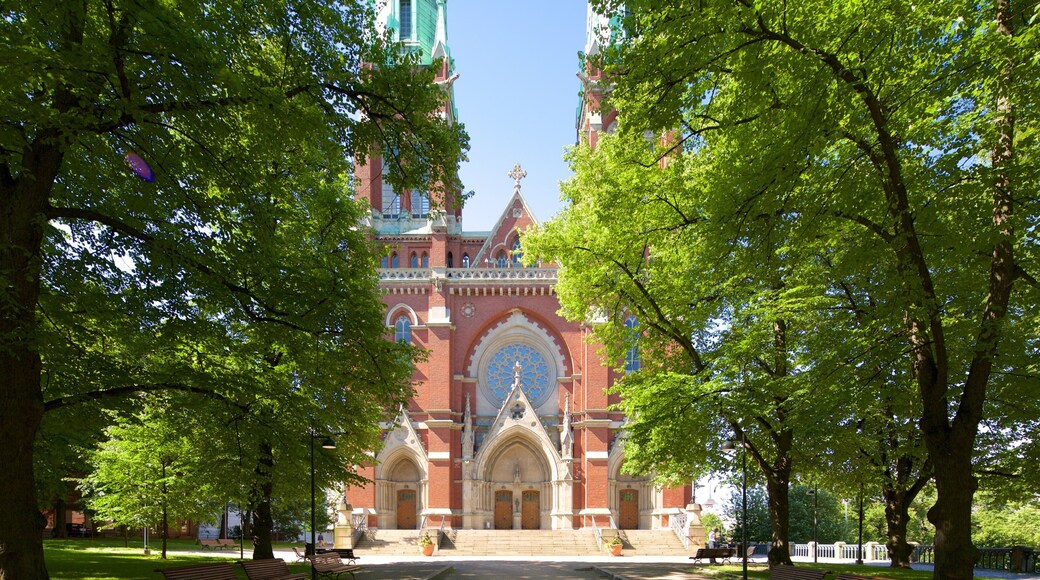 Eglise Saint-Jean montrant église ou cathédrale et parc