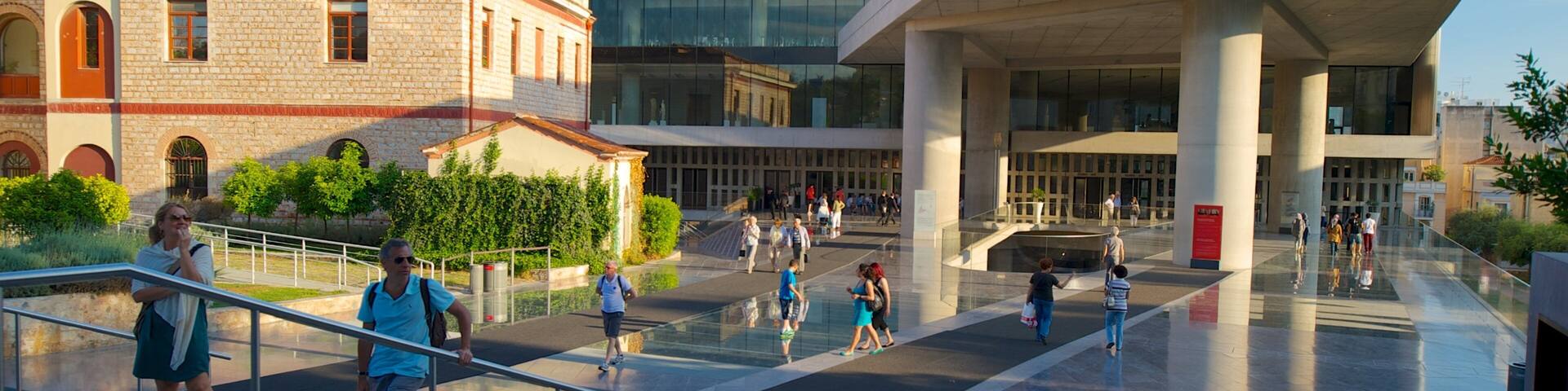 Acropolis Museum featuring a city as well as a large group of people