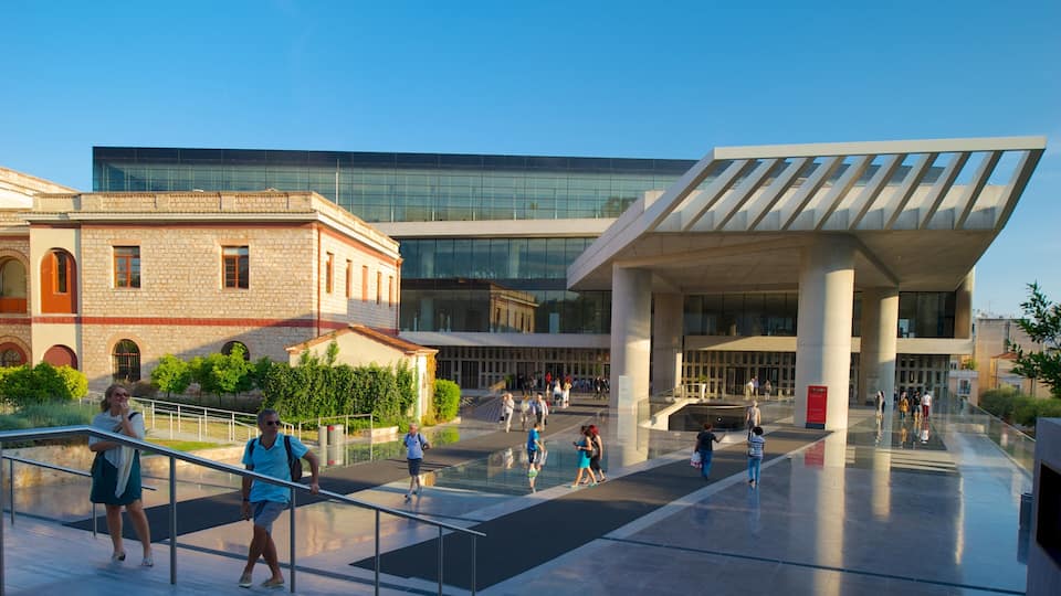 Acropolis Museum showing a city as well as a large group of people