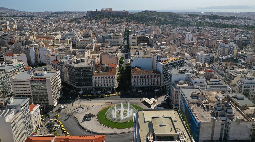 Aerial drone photo of recently renovated Omonoia square featuring huge round fountain, Athens centre, Attica, Greece
