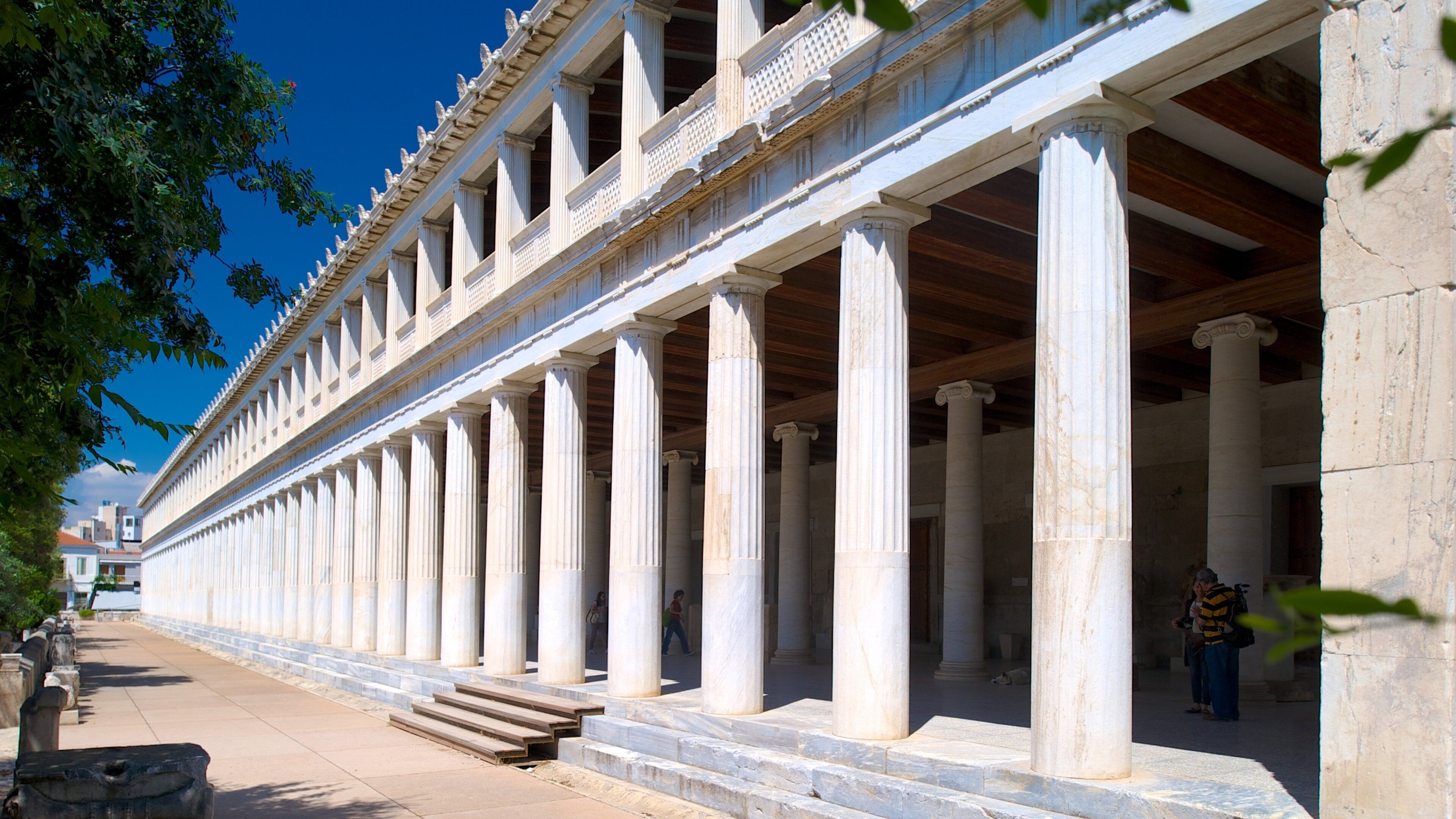 Stoa of Attalos showing a temple or place of worship, street scenes and heritage architecture