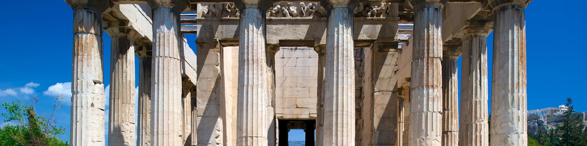 An ancient Greek temple with Doric columns and a triangular pediment.