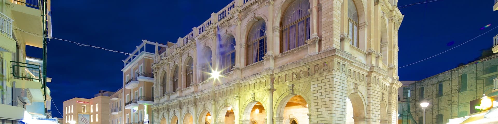 Heraklion Loggia which includes heritage architecture, night scenes and street scenes
