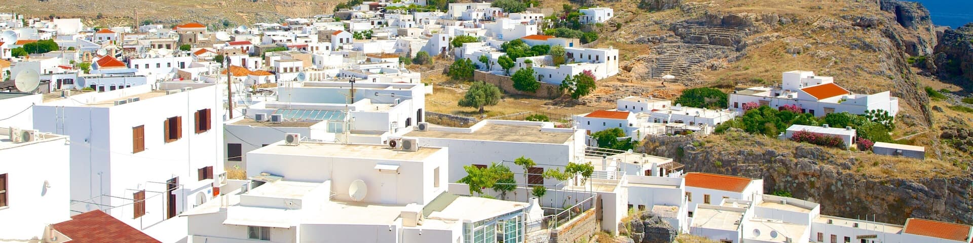 Acropolis of Lindos featuring a small town or village