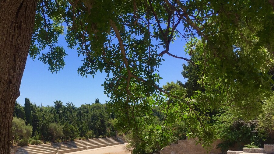 The Acropolis in Rhodes was built 3rd to 2nd century B.C. It stretches over several terraces with the ruins and 3 columns still standing of an Appollon-Pythios Temple, a reconstructed amphi theatre and a 210 m long stadium.