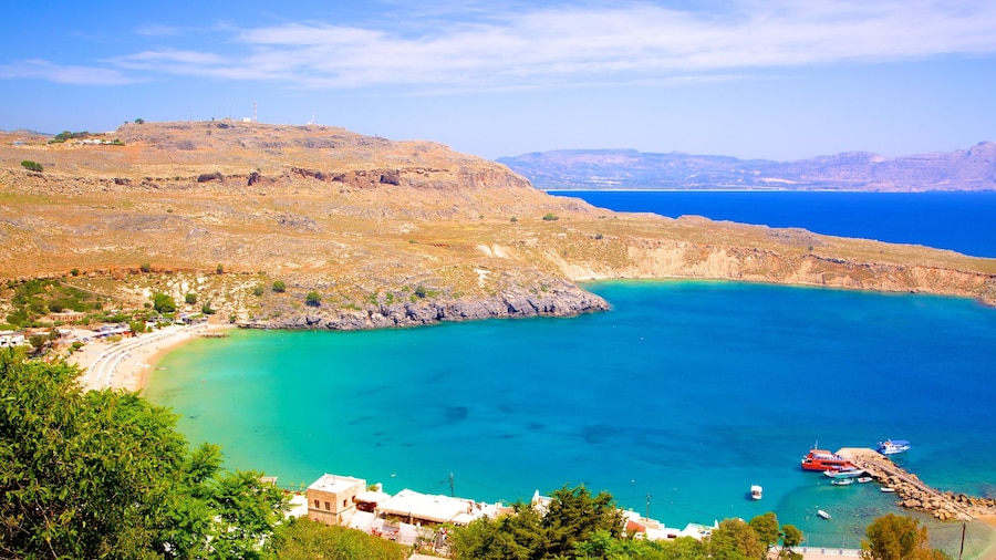 Lindos Beach which includes general coastal views and a bay or harbor