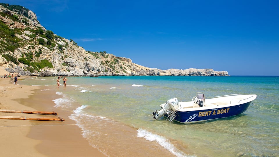 A beach with a boat labeled "RENT A BOAT" anchored in shallow water, a rocky cliff in the background, and people walking along the shore.