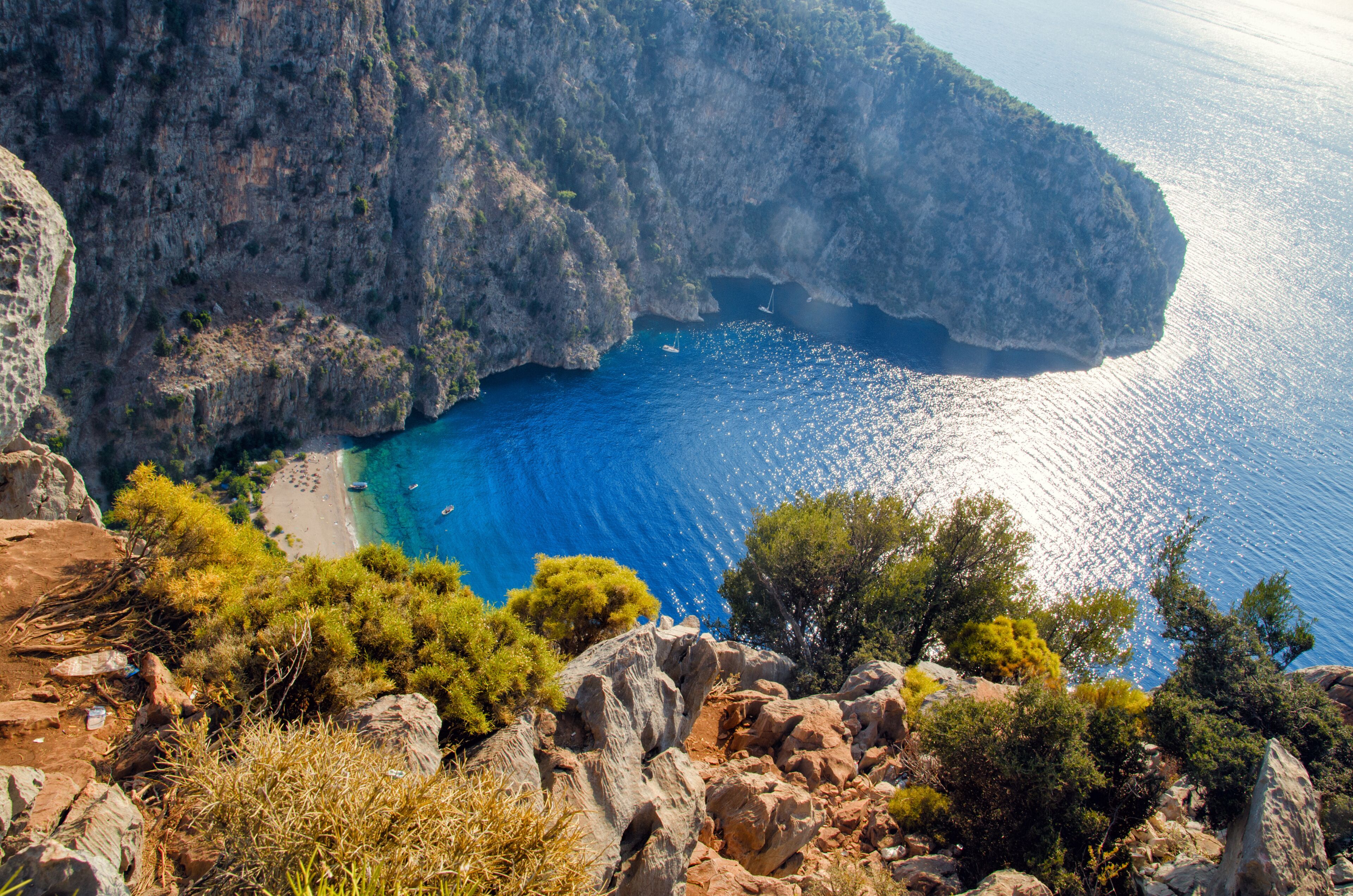 Aerial view of Butterfly valley in Oludeniz. Sunny summer beach landscape top view. Fethiye, Turkey nature landmark