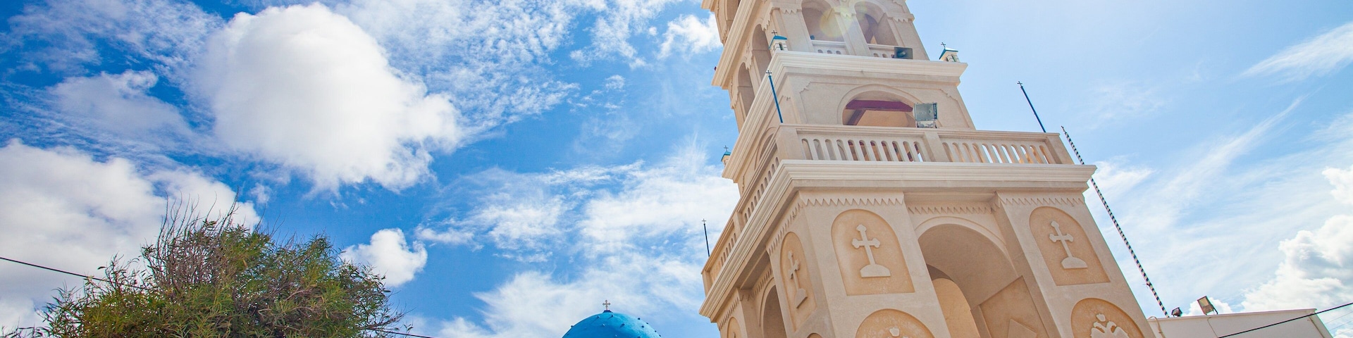 Santorini showing a sunset and heritage architecture