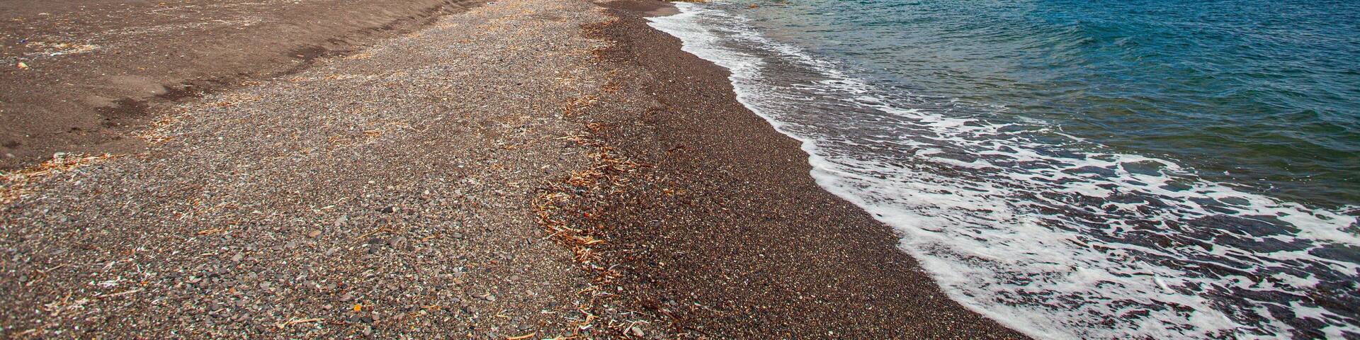 Santorini showing rocky coastline and general coastal views