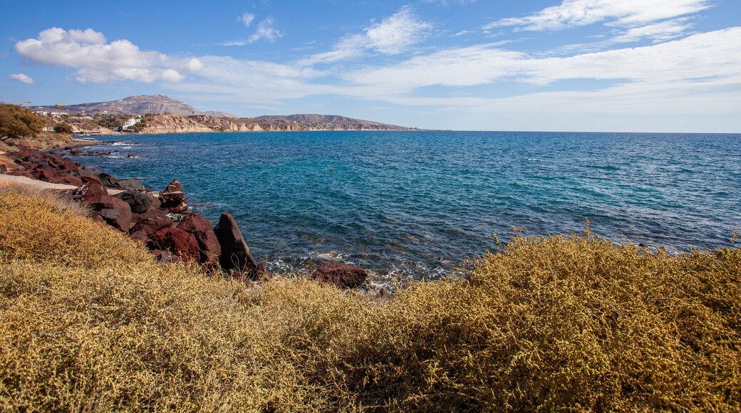 Santorini which includes landscape views and rugged coastline