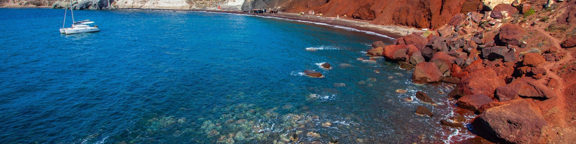 Red Beach showing rugged coastline and general coastal views