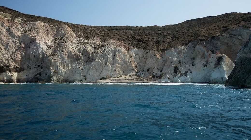 White Beach Santorini: The cove right next to the Red beach, on the southern side of Santorini, is known as the White beach. It is very similar to the Red beach, with black pebbles on the shore, only that the surrounding cliffs are white. This beach is accessible by boat or on foot from the Red beach.