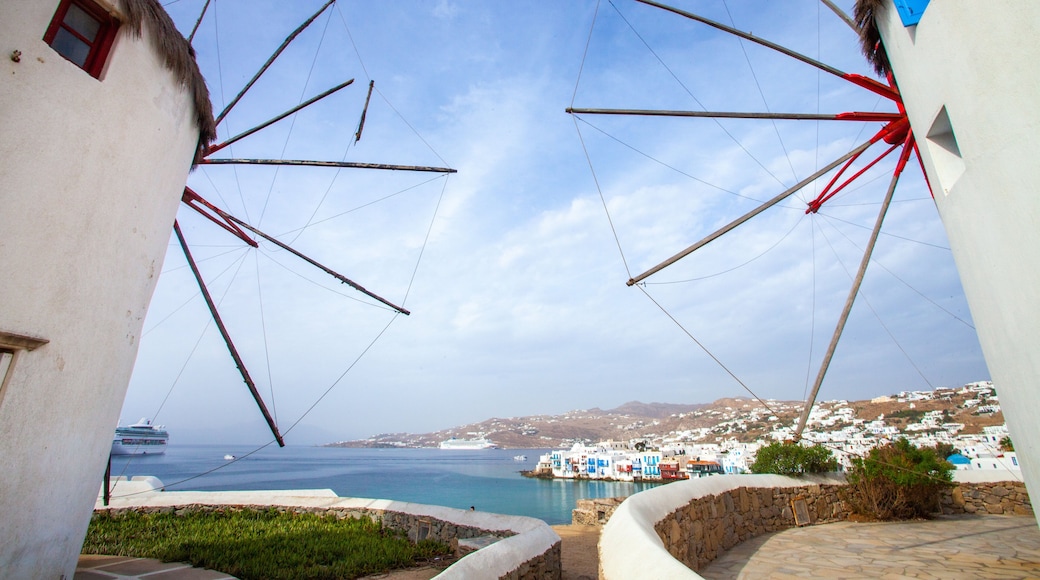 Windmills of Mykonos showing a coastal town