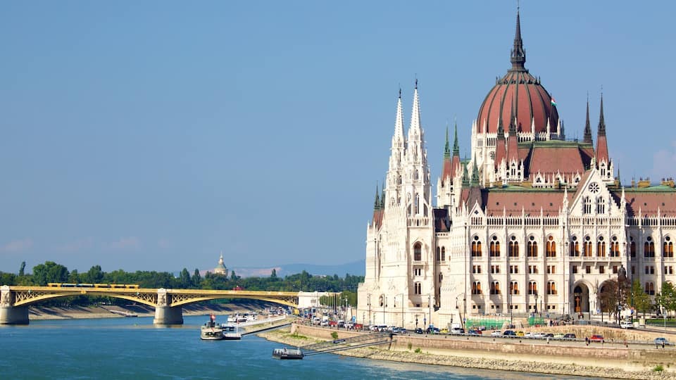 Budapest featuring a river or creek, a bridge and an administrative buidling
