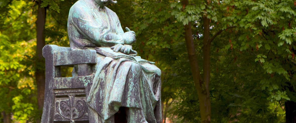 City Park featuring a garden and a statue or sculpture