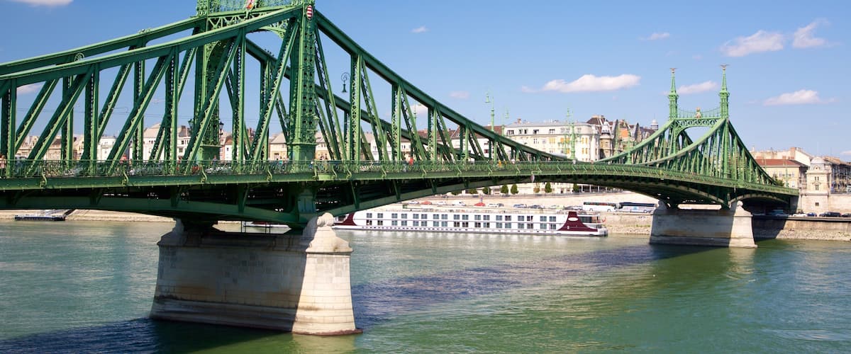 Liberty Bridge featuring a bridge and a river or creek