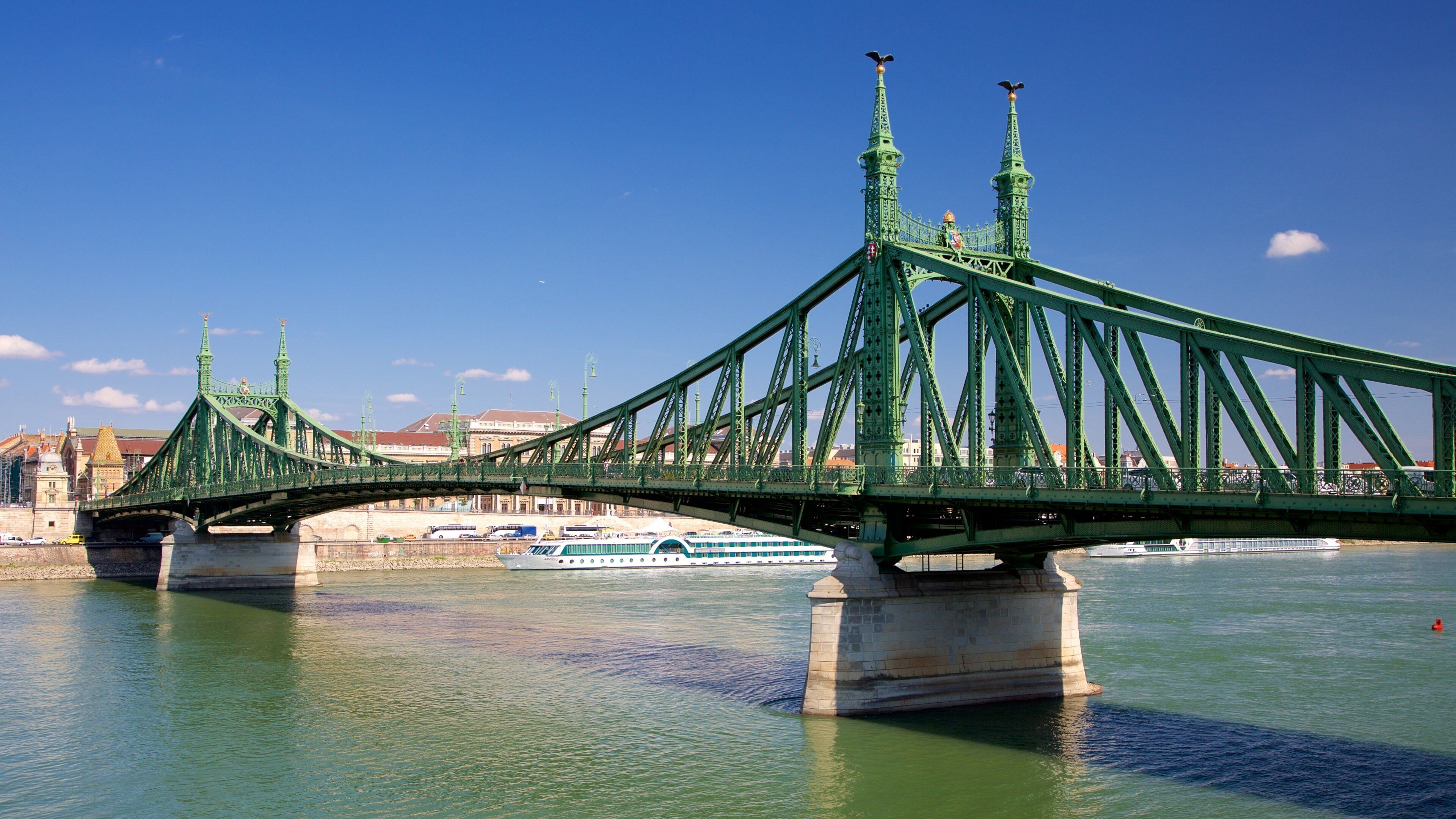 Liberty Bridge showing a river or creek and a bridge