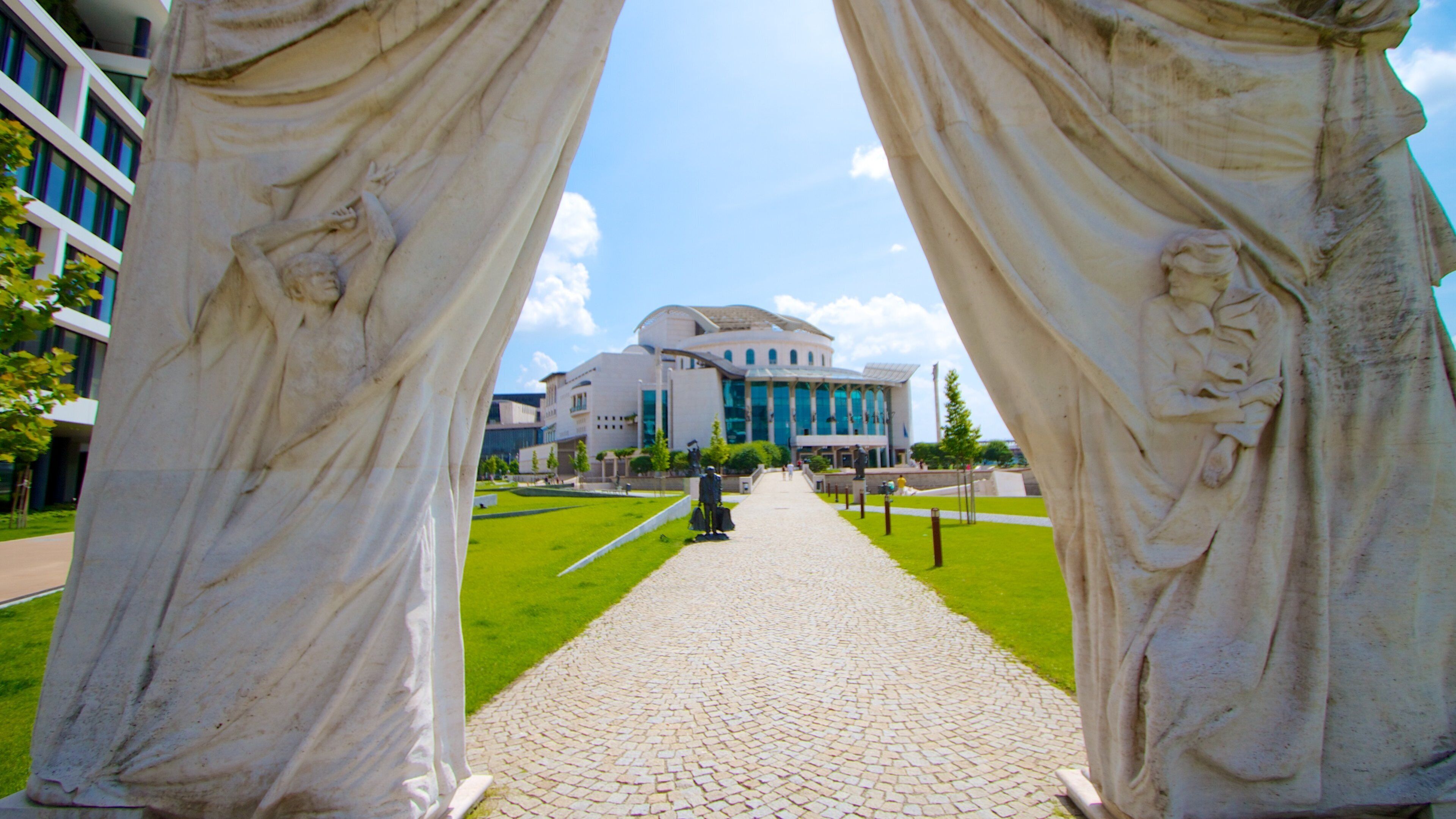 National Theater showing theater scenes and a city