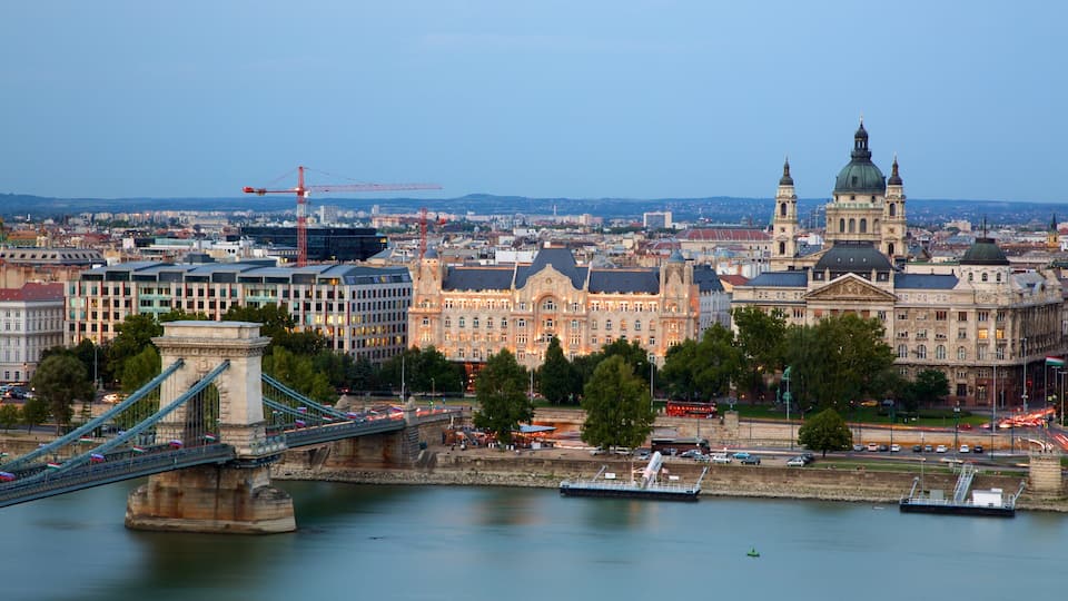 St. Stephen\'s Basilica showing a river or creek, a bridge and a city