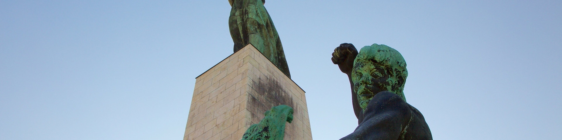 Liberty Statue featuring a monument and a statue or sculpture