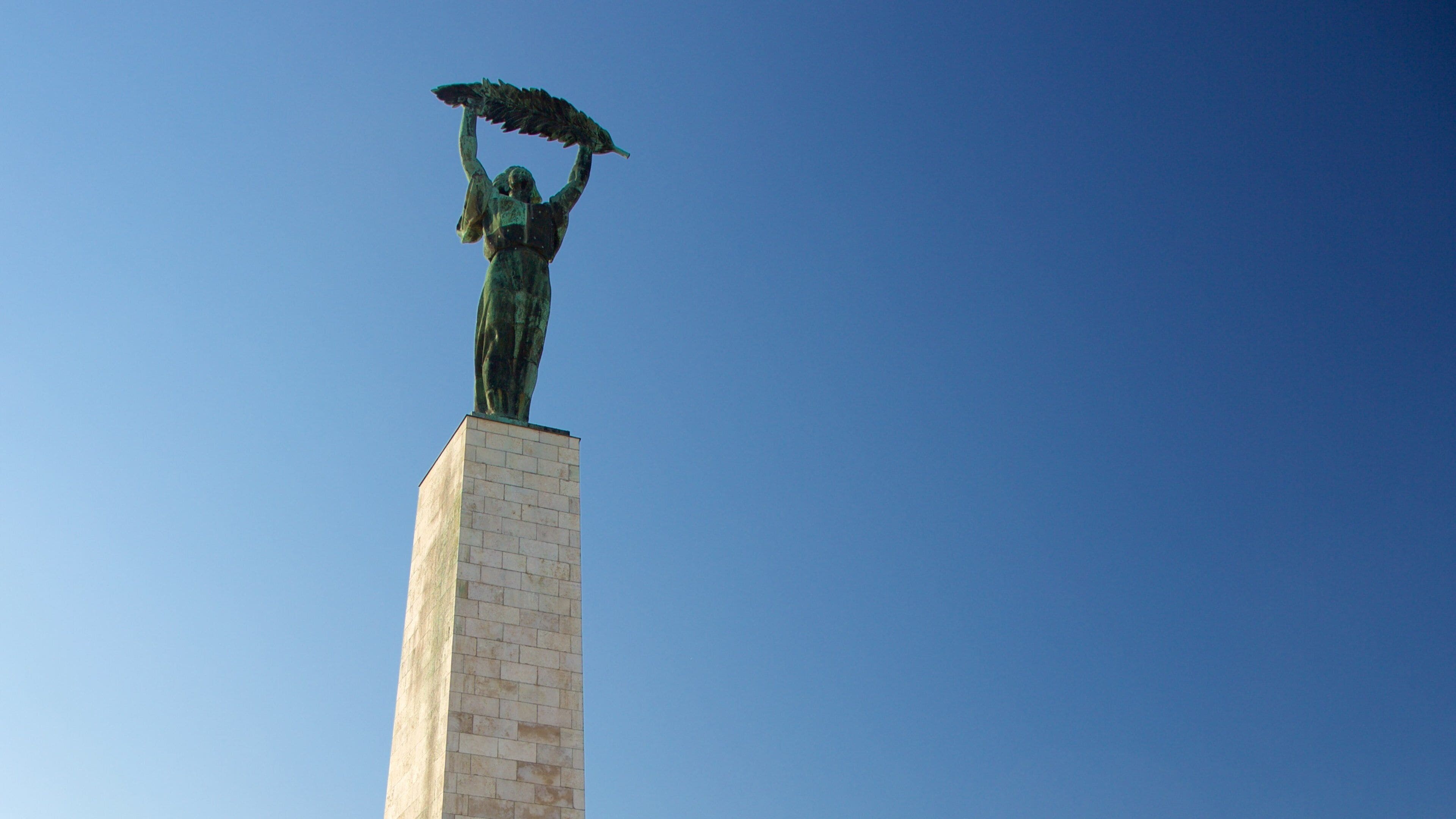 Liberty Statue featuring a monument and a statue or sculpture