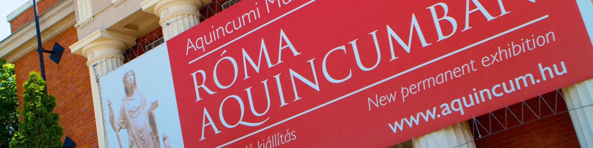 Museo y jardín de ruinas Aquincum ofreciendo señalización y una ciudad