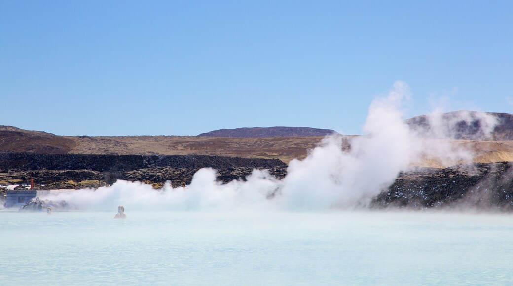 Blue Lagoon showing mist or fog and a hot spring