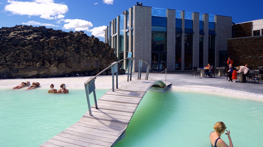 Blue Lagoon showing a hot spring, a luxury hotel or resort and swimming