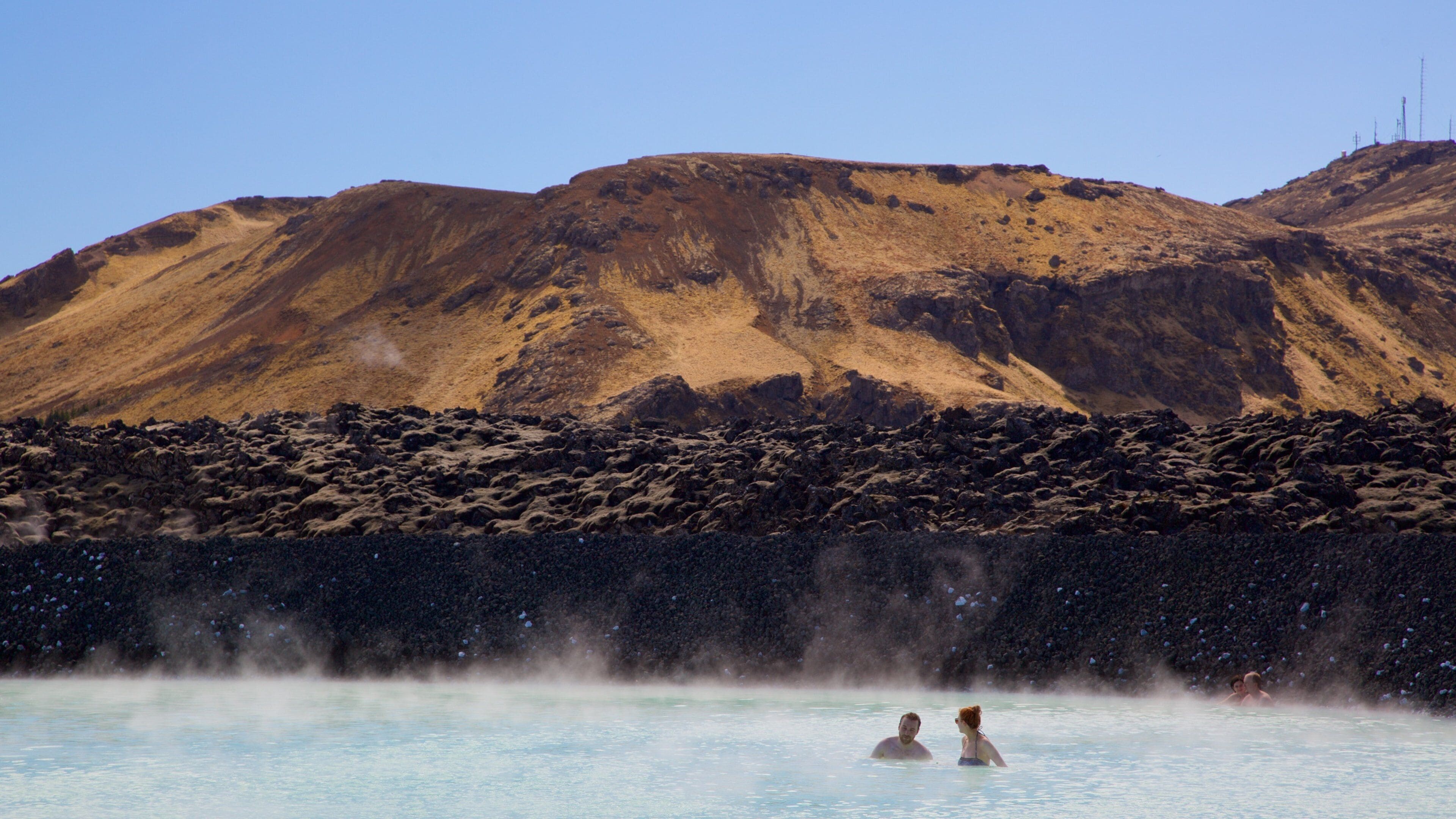 Blue Lagoon which includes mist or fog, swimming and a hot spring