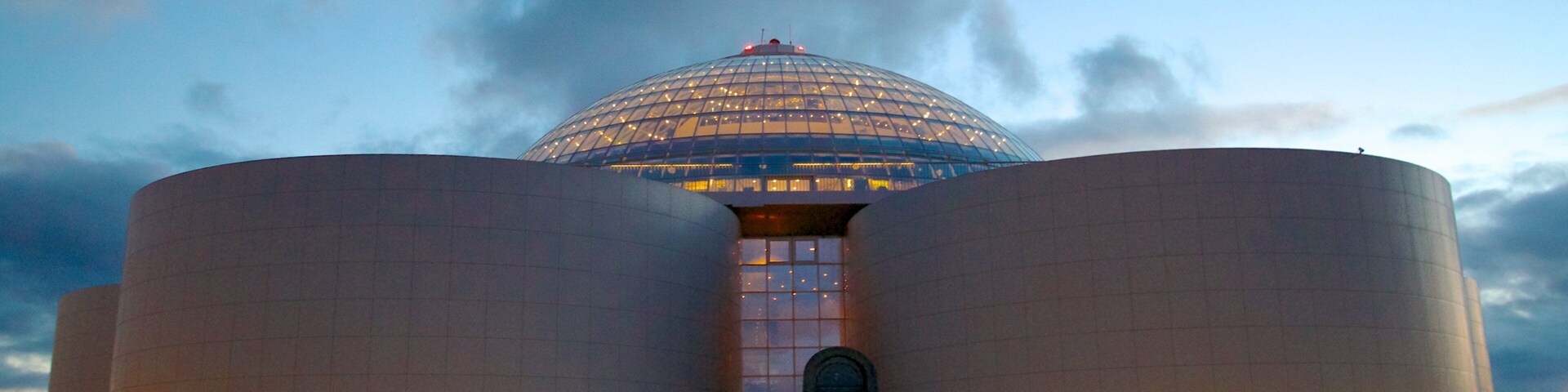 Perlan featuring night scenes and modern architecture