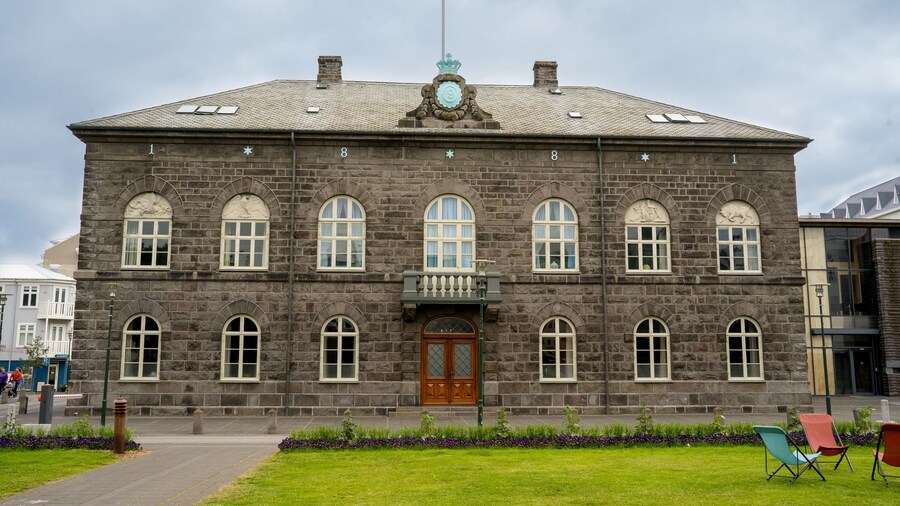 Reykjavík, Iceland - July 4, 2022 a horizontal view of the Althingi Parliament House, a classical 19th century structure which stands by Austurvöllur in central Reykjavík, Iceland.