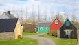 Árbær Open Air Museum showing street scenes, a house and farmland