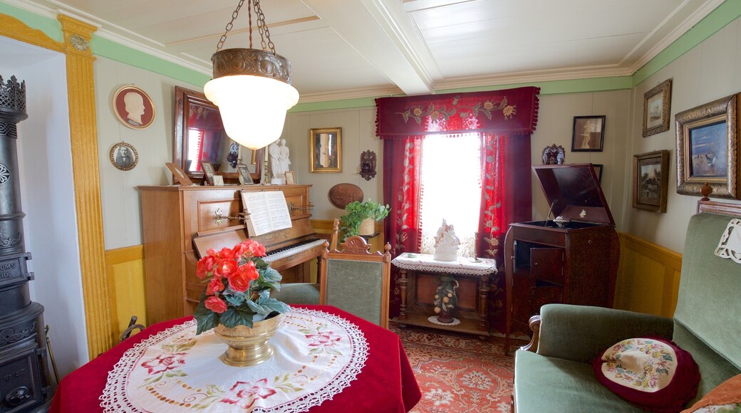 Arbaejarsafn showing a house and interior views