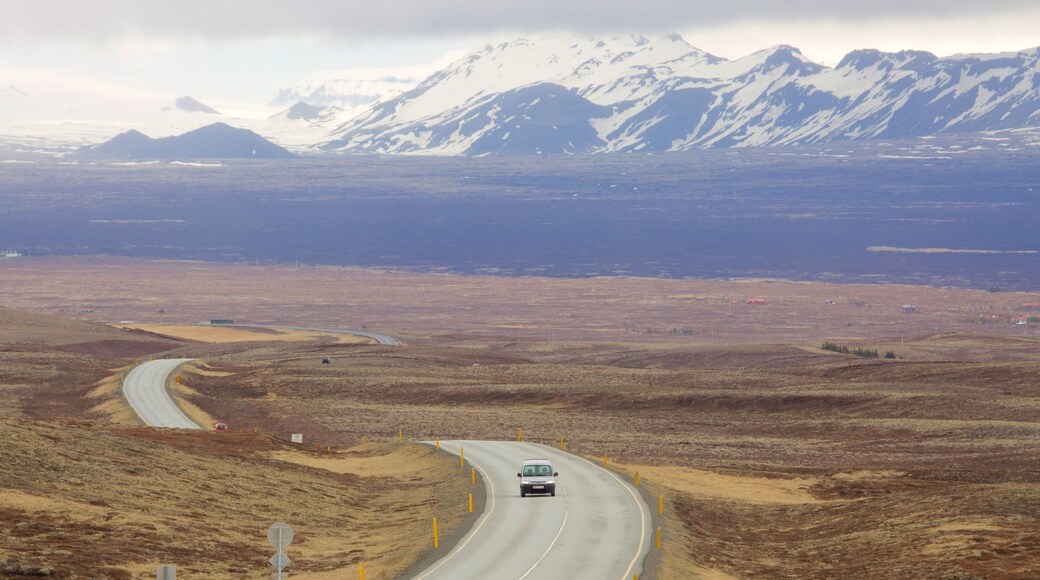 Thingvellir National Park which includes mountains, vehicle touring and landscape views